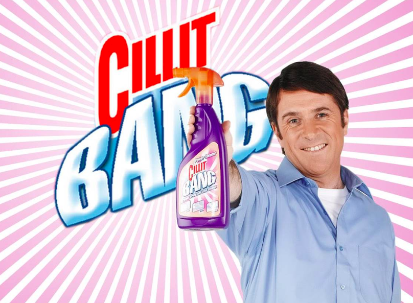 man holding air freshner bottle